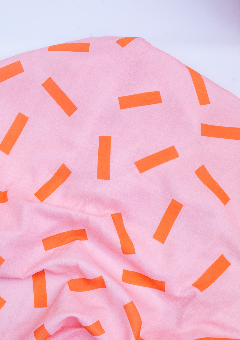 musselin-streifen-grafische.muster-rosa-orange
